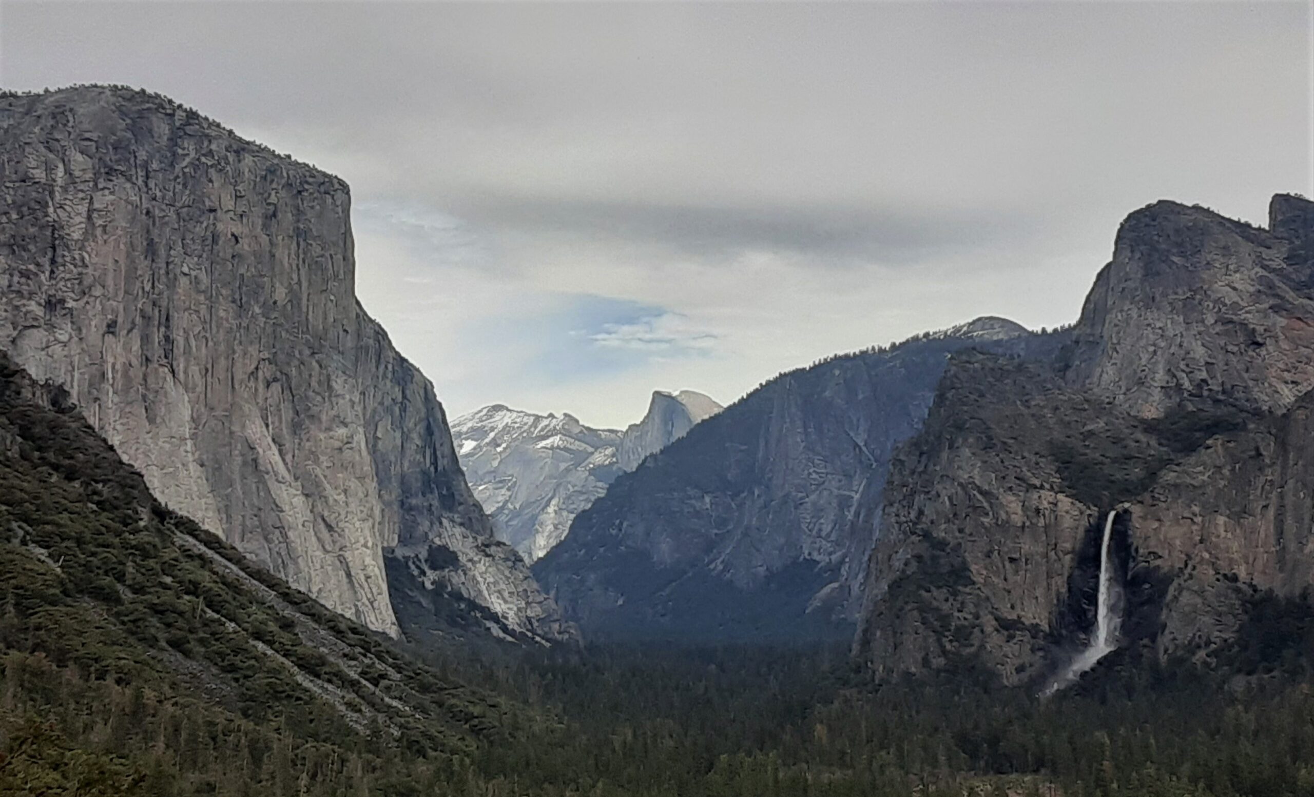 Iconic view in Yosemite: El Capitan, Half Dome, and Bridal Veil Falls